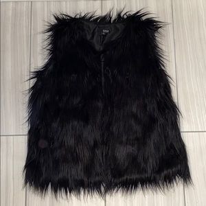 Black faux fur vest